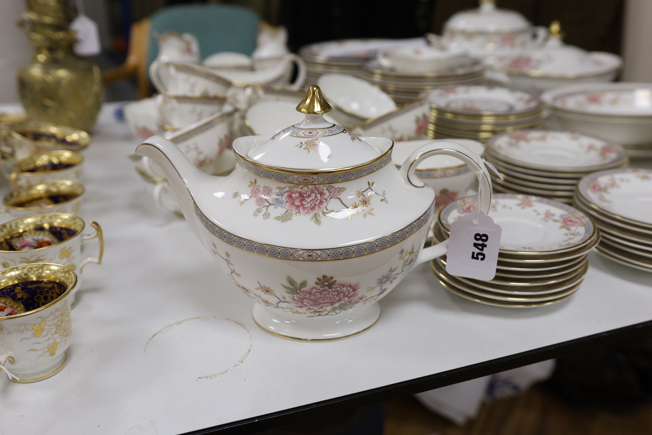 An extensive Royal Doulton Canton pattern dinner service as used by The Queen and Paddington bear in the Jubilee sketch